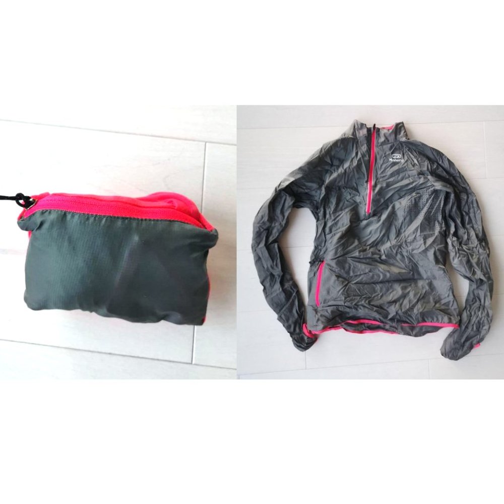 Like new Packable windbreaker in pocket running jacket xs